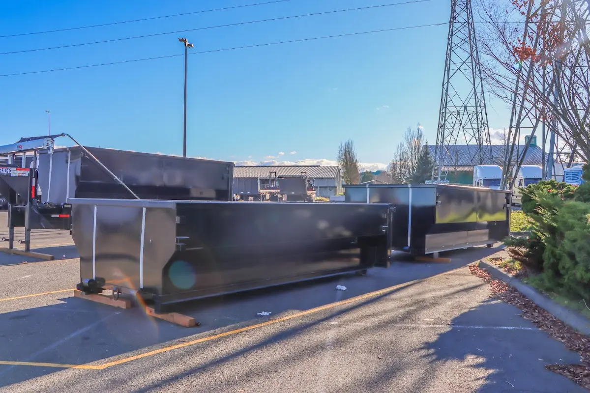 Roll-off dumpster ready for waste disposal at job site for 2 Yard Dumpster Rental in Cleburne